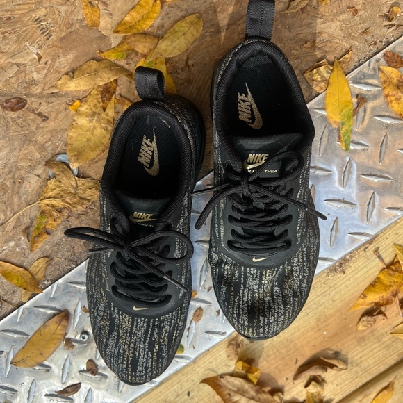 Like New Nike Black and Gold Sneakers Women’s size 5 Airmax Thea - Picture 1 of 3